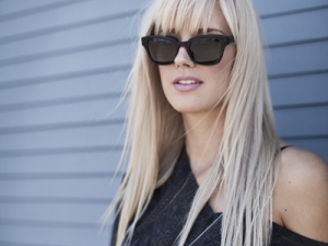 Morgan wearing Joe's Black Sunglass friezeframes